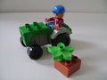 Groen grijze tractor/trekker met boer