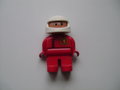 Coureur / Racer met witte helm en rood uniform met nr: "1".  