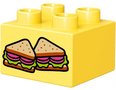Lichtgeel 4-nops blokje met afbeelding van 2 sandwiches / boterhammen (NIEUW)